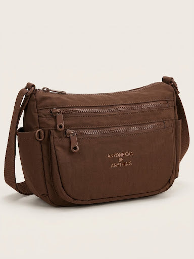 Sac bandoulière multi-poches demi-lune